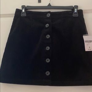 Black corduroy mini skirt